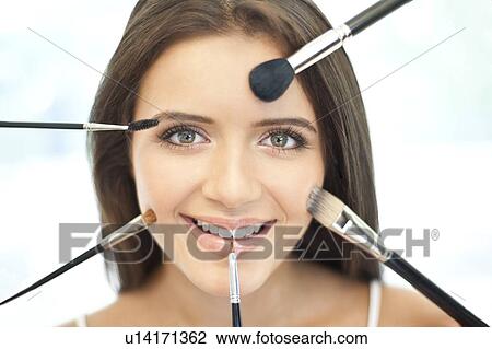 Stock Image - Make-up, conceptual image.. Fotosearch