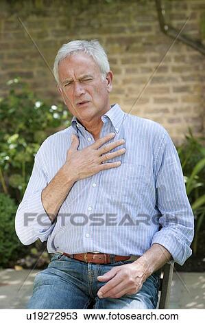 Man with angina. View Large Photo Image Stock Image - Man with angina.. Fotosearch