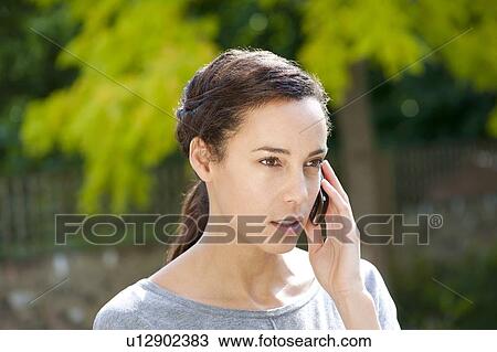 Stock Image - Mobile phone use.. Fotosearch