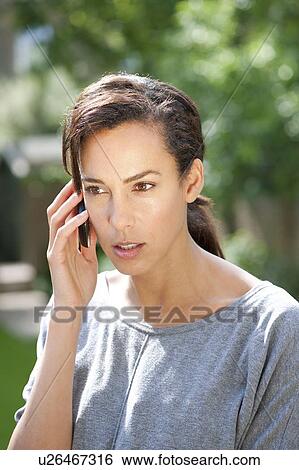 Stock Photograph - Mobile phone use.. Fotosearch
