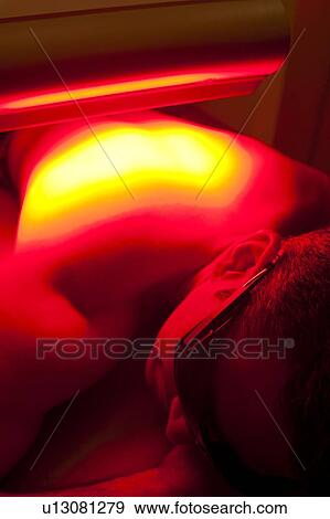 Photodynamic therapy. Patient undergoing photodynamic therapy. View Large Photo Image Stock Photo - Photodynamic therapy. Patient undergoing photodynamic therapy.. Fotosearch