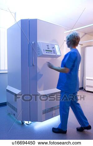 Phototherapy booth. Dermatologist setting up an ultraviolet B phototherapy booth. View Large Photo Image Stock Image - Phototherapy booth. Dermatologist setting up an ultraviolet B phototherapy booth.. Fotosearch