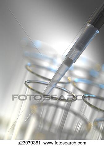 Pipetting liquid into a test tube. View Large Photo Image Stock Image - Pipetting liquid into a test tube.. Fotosearch