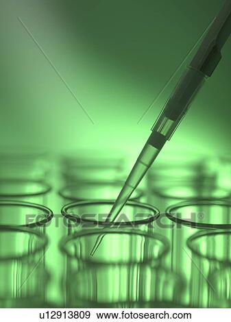 Pipetting liquid into a test tube. View Large Photo Image Stock Photo - Pipetting liquid into a test tube.. Fotosearch