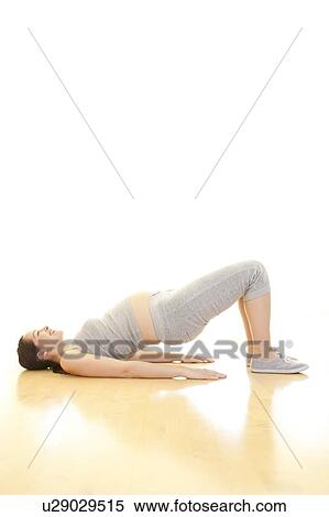 Pregnant woman doing yoga. View Large Photo Image Stock Photography - Pregnant woman doing yoga.. Fotosearch