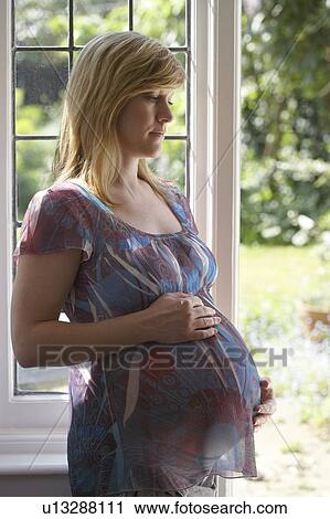Pregnant woman. She is 35 weeks pregnant. View Large Photo Image Stock Image - Pregnant woman. She is 35 weeks pregnant.. Fotosearch