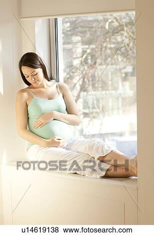 Stock Photo - Pregnant woman.. Fotosearch