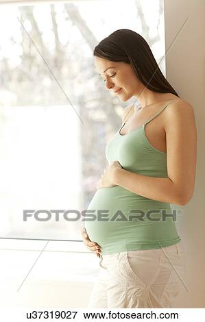 Pregnant woman. View Large Photo Image Stock Photo - Pregnant woman.. Fotosearch
