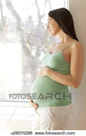 Pregnant woman. View Large Photo Image Stock Photograph - Pregnant woman.. Fotosearch