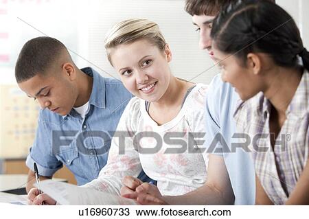 Stock Image - Pupils working together.. Fotosearch