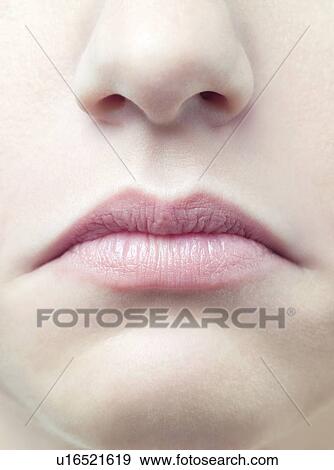 Stock Photo - Unhappy woman's mouth.. Fotosearch