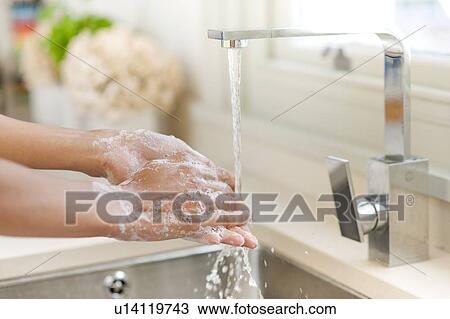 Stock Image - Washing hands.. Fotosearch