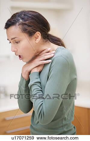 Stock Photo - Woman choking.. Fotosearch