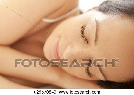 Stock Photo - Woman sleeping, close-up.. Fotosearch