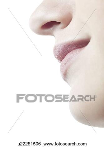 Stock Photograph - Woman's nose and mouth.. Fotosearch