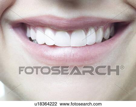 Stock Image - Woman's smile.. Fotosearch