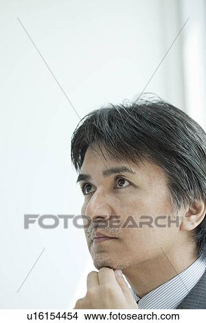 Picture - A businessman. Fotosearch