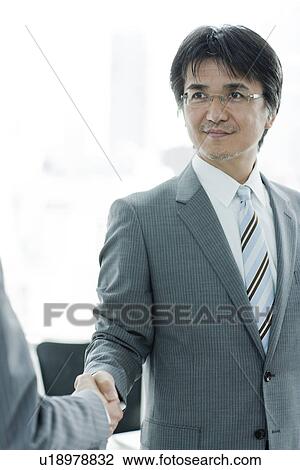 Stock Image - A businessman. Fotosearch