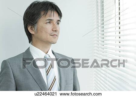 Stock Image - A businessman. Fotosearch