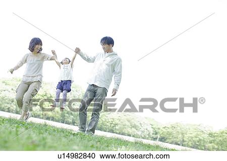 A family holding hands View Large Photo Image Stock Image - A family holding hands. Fotosearch