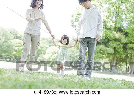 A family holding hands View Large Photo Image Stock Photography - A family holding hands. Fotosearch