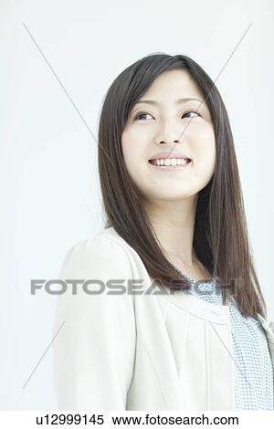 A young woman smiling View Large Photo Image Stock Photography - A young woman smiling. Fotosearch