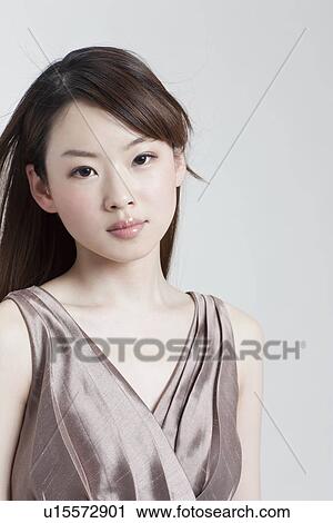 Stock Image - A young woman. Fotosearch