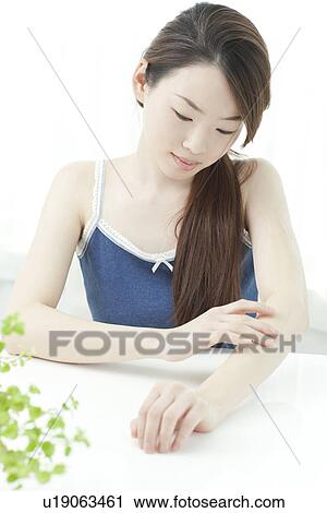 Stock Image - A young woman. Fotosearch