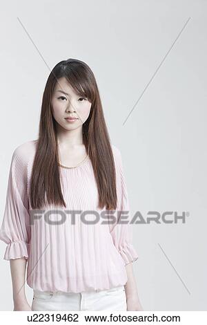 Stock Image - A young woman. Fotosearch