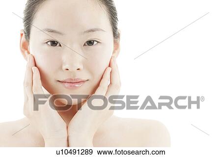 Stock Photo - A young woman. Fotosearch