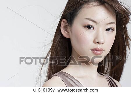A young woman View Large Photo Image Stock Photo - A young woman. Fotosearch
