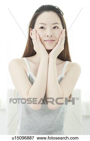Stock Photo - A young woman. Fotosearch