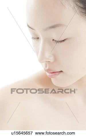 Stock Photo - A young woman. Fotosearch