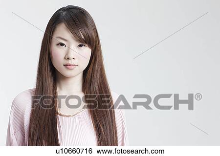 A young woman View Large Photo Image Stock Photograph - A young woman. Fotosearch