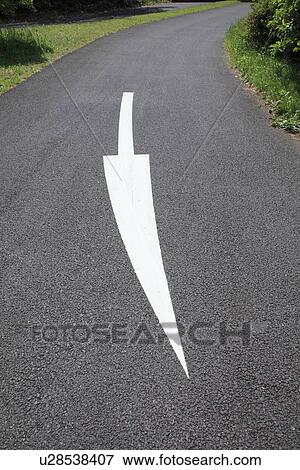 Arrow on a country road View Large Photo Image Stock Photo - Arrow on a country road. Fotosearch