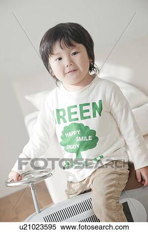 Boy playing with toy car View Large Photo Image Stock Photography - Boy playing with toy car. Fotosearch