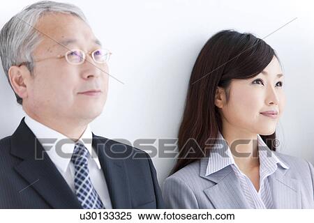 Businessman and Businesswoman Smiling View Large Photo Image Stock Photography - Businessman and Businesswoman Smiling. Fotosearch
