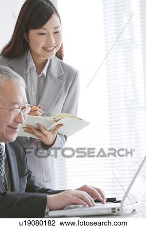 Businessman and Businesswoman View Large Photo Image Stock Image - Businessman and Businesswoman. Fotosearch