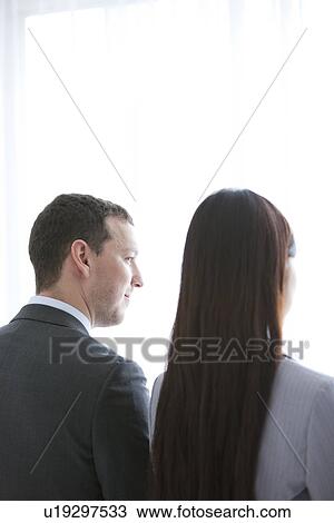Businessman and Businesswoman View Large Photo Image Stock Image - Businessman and Businesswoman. Fotosearch