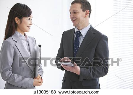 Businessman and Businesswoman View Large Photo Image Stock Photo - Businessman and Businesswoman. Fotosearch