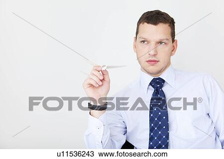 Stock Image - Businessman at Desk. Fotosearch