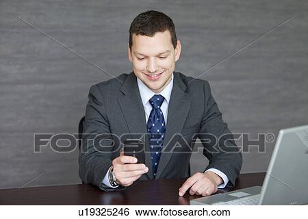 Businessman at Desk View Large Photo Image Stock Photograph - Businessman at Desk. Fotosearch