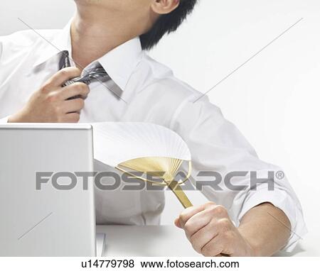 Businessman Cooling Down With Fan View Large Photo Image Stock Photo - Businessman Cooling Down With Fan. Fotosearch