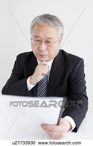 Businessman Reading View Large Photo Image Stock Image - Businessman Reading. Fotosearch