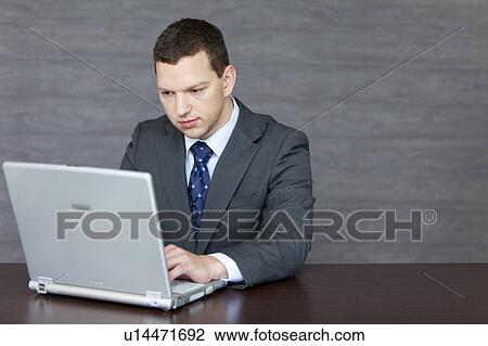 Businessman With Laptop View Large Photo Image Stock Image - Businessman With Laptop. Fotosearch