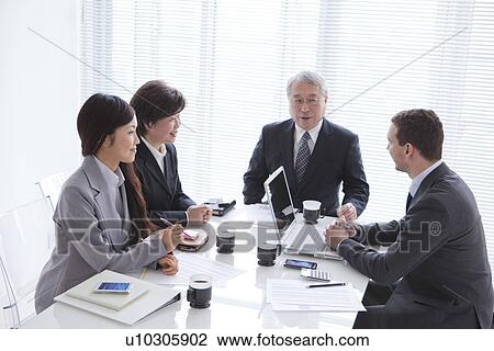 Businessmen and Businesswomen In a Meeting View Large Photo Image Stock Image - Businessmen and Businesswomen In a Meeting. Fotosearch