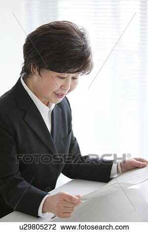 Businesswoman at Desk View Large Photo Image Stock Image - Businesswoman at Desk. Fotosearch