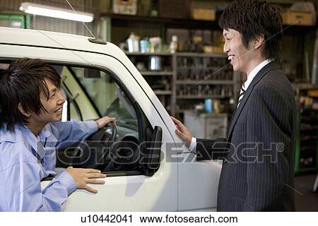Car Mechanic Talking to Client View Large Photo Image Stock Image - Car Mechanic Talking to Client. Fotosearch