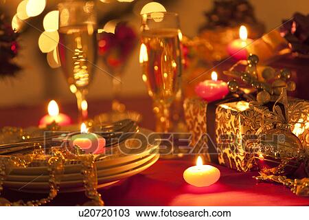 Stock Image - Christmas Decorations and Candles. Fotosearch