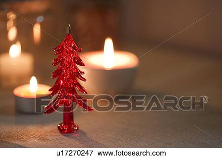 Christmas tree and candles View Large Photo Image Stock Photo - Christmas tree and candles. Fotosearch